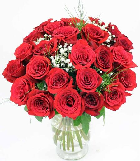 two dozen red roses in glass vase to vietnam